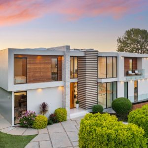 contemporary-two-level-home-on-hillside-with-shrub-2024-06-18-18-49-05-utc